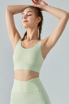 TrainTech Faux Layered Twist Back Cutout Sports Bra - FleekGoddess