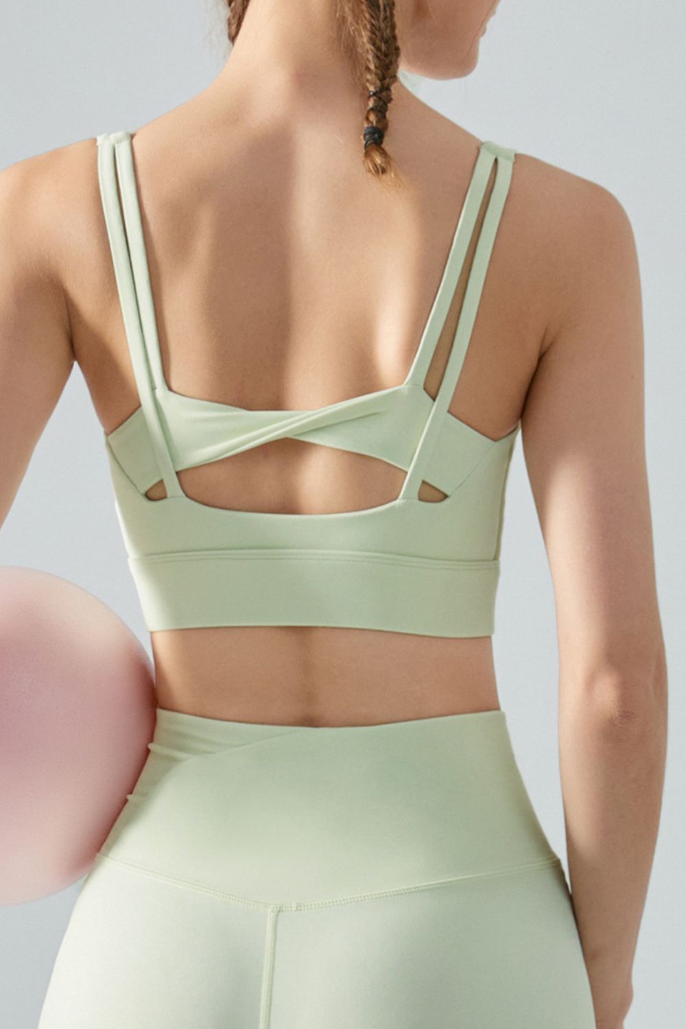 TrainTech Faux Layered Twist Back Cutout Sports Bra - FleekGoddess