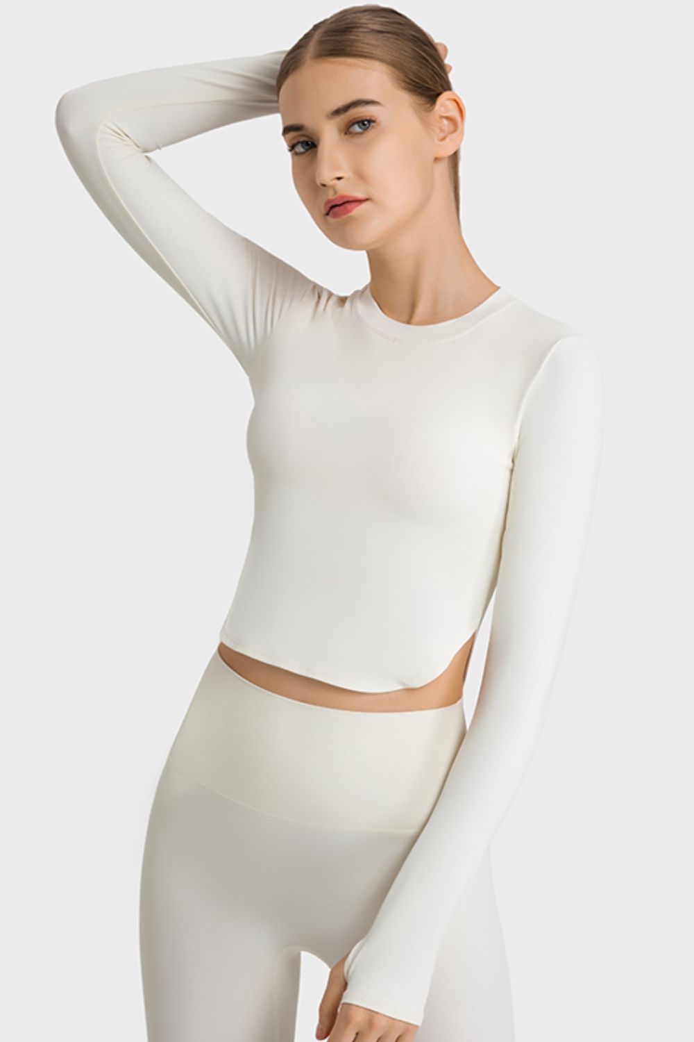 TrainTech Side Slit Long Sleeve Round Neck Crop Top - FleekGoddess